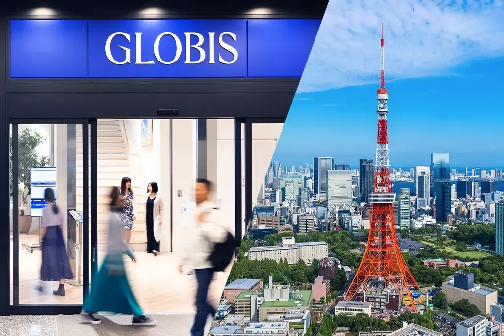 People entering a GLOBIS campus building alongside a view of the Tokyo skyline featuring Tokyo Tower.
