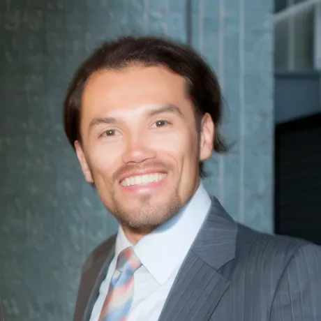 Headshot of David E. Villagómez A.